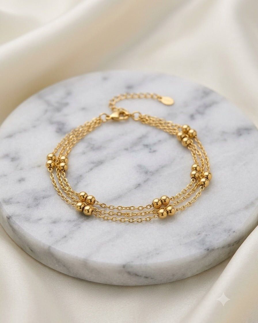 Triple Strand Gold Bead Bracelet