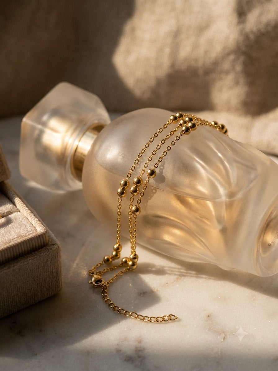 Triple Strand Gold Bead Bracelet