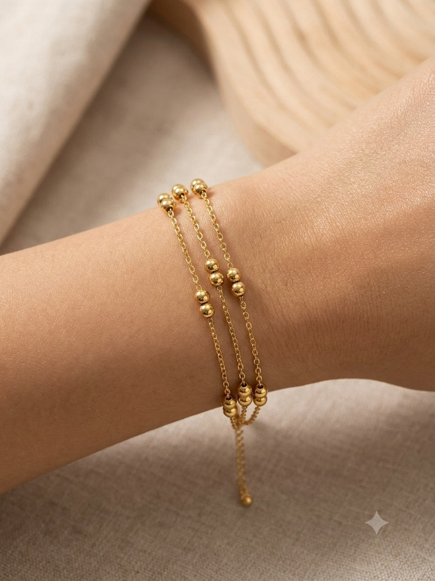 Triple Strand Gold Bead Bracelet